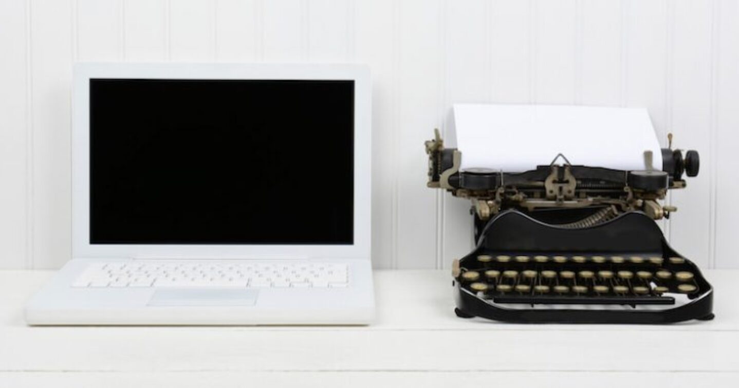 Laptop and typewriter