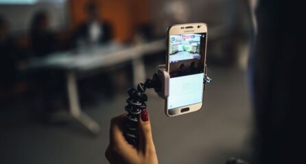 person creating a video with mobile phone