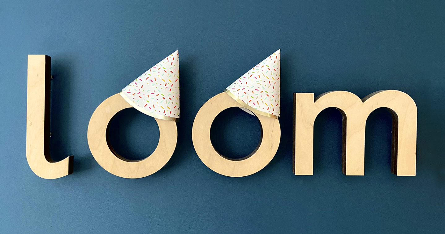 Loom logo with party hats